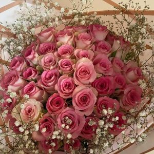40 Roses Bouquet hugged by babybreath